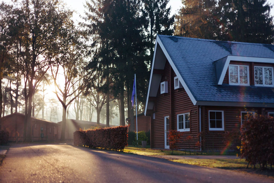 Sunset view of brick home | Home Insurance